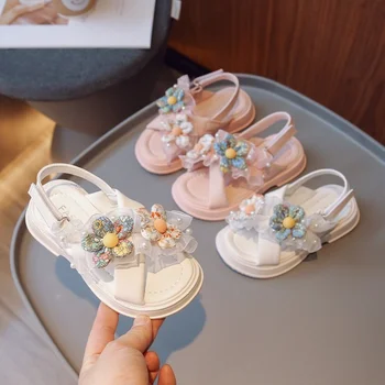 Сандали за девочек2023, лятна нова мода обувки принцеса в корейски стил за момичета с цветя модел, детска универсална плажни обувки с перли подметка