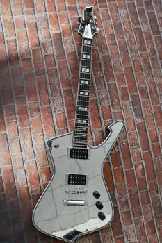 Метална китара огледално форми с уникални характеристики, вградени наслоявания от палисандрово дърво и е изпратена у дома